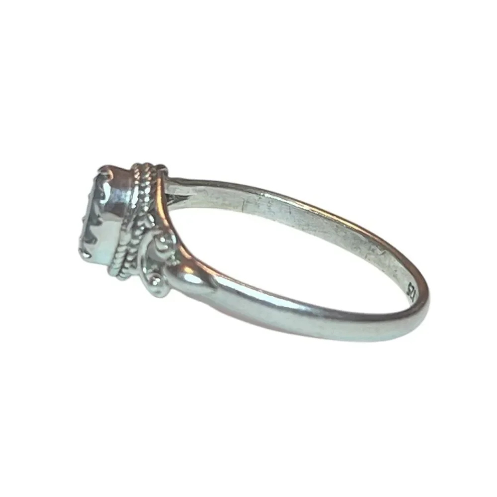 Elegant Sterling Silver and Blue Topaz Gemstone Ring Size 10